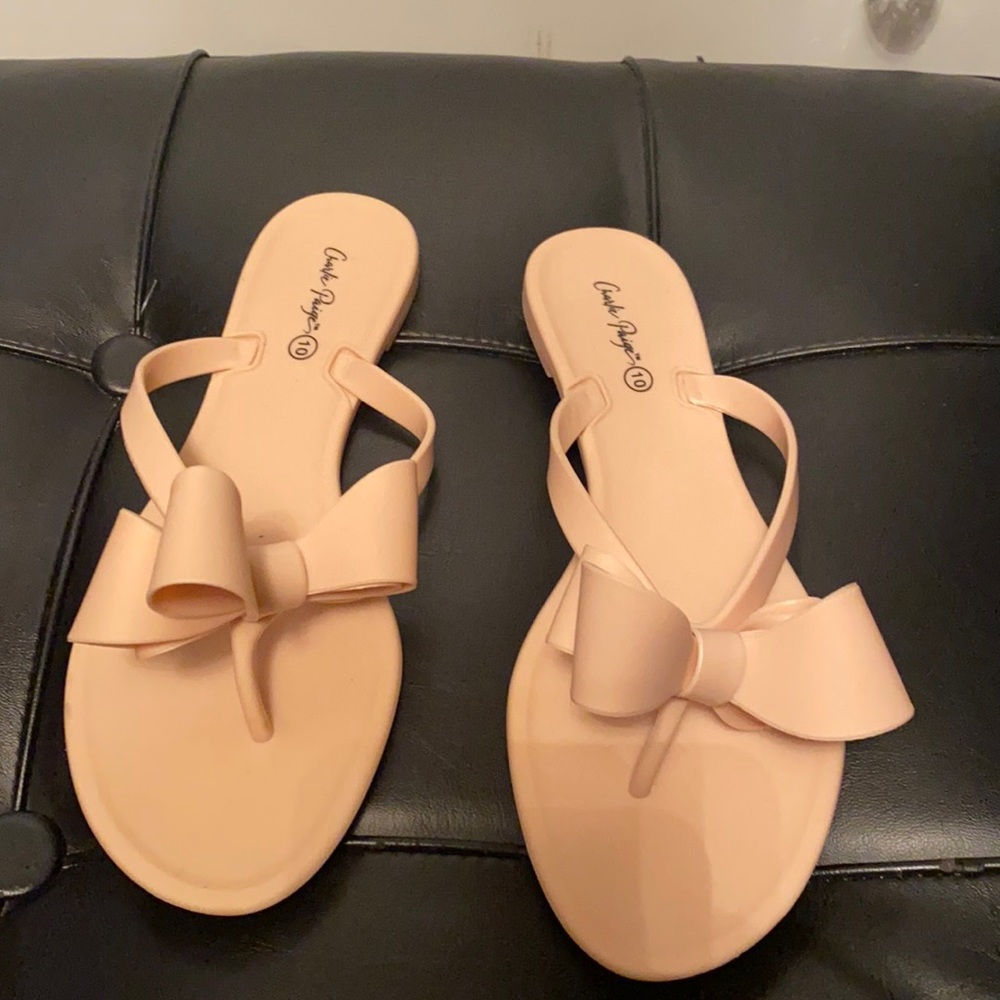 Jelly like/plastic flip flops pink, bow detail